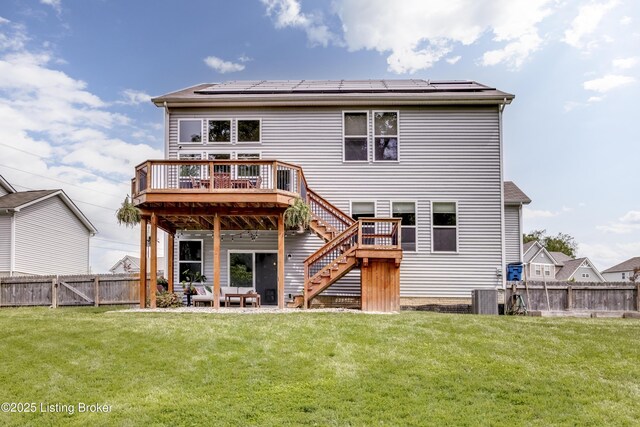 3928 Creek Meadow Dr, La Grange, KY 40031 - rear view of house featuring a wooden deck, stairs, solar panels, and central AC unit