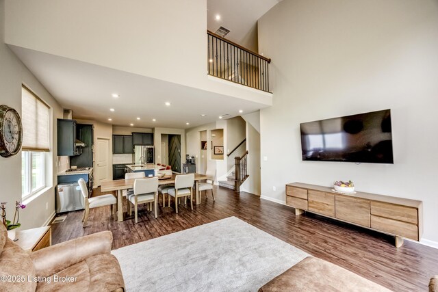 3928 Creek Meadow Dr, La Grange, KY 40031 - living room featuring stairs, dark wood-style floors, recessed lighting, and baseboards
