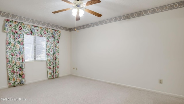 3030 Breckenridge Ln Unit 108, Louisville, KY 40220 - spare room with carpet, baseboards, and a ceiling fan