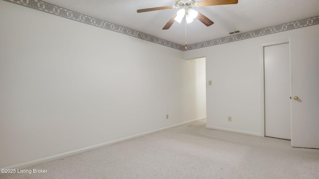 3030 Breckenridge Ln Unit 108, Louisville, KY 40220 - spare room featuring ceiling fan, light colored carpet, and baseboards