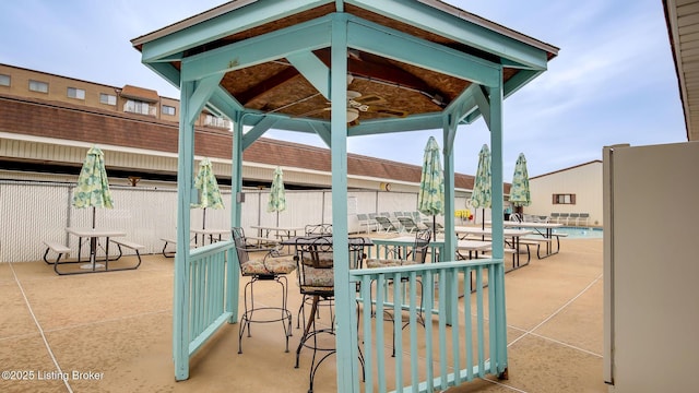 3030 Breckenridge Ln Unit 108, Louisville, KY 40220 - view of patio / terrace featuring a gazebo, a community pool, and ceiling fan