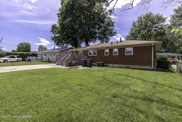 7407 Beahl Blvd, Louisville, KY 40258 - back of property featuring brick siding and a deck