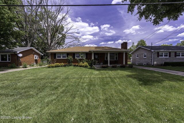 7407 Beahl Blvd, Louisville, KY 40258 - ranch-style house featuring covered porch, a chimney, a front lawn, and brick siding