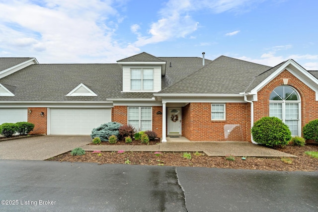 10431 Monticello Forest Cir, Jeffersontown, KY 40299 - view of front of home featuring asphalt driveway, brick siding, and a shingled roof