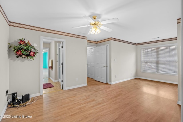 10431 Monticello Forest Cir, Jeffersontown, KY 40299 - unfurnished bedroom with light wood-type flooring, baseboards, ornamental molding, and ceiling fan