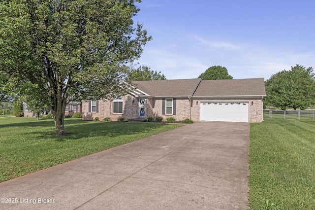 1020 Polley Dr, Bardstown, KY 40004 - view of front of home with driveway, a garage, and brick siding