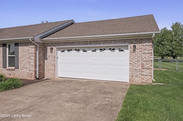 1020 Polley Dr, Bardstown, KY 40004 - view of home's exterior with driveway, roof with shingles, brick siding, and an attached garage