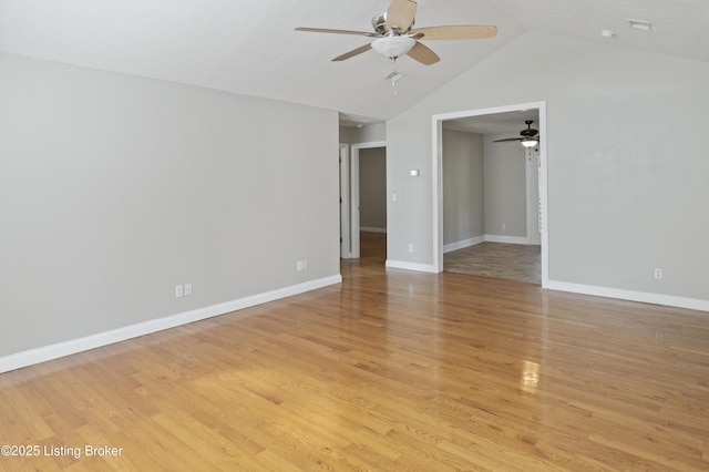 1020 Polley Dr, Bardstown, KY 40004 - empty room featuring ceiling fan, light wood-style floors, vaulted ceiling, and baseboards