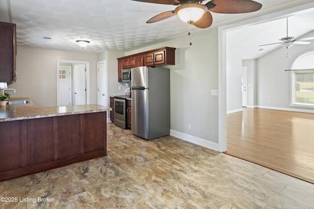 1020 Polley Dr, Bardstown, KY 40004 - kitchen with appliances with stainless steel finishes, a ceiling fan, a sink, and baseboards