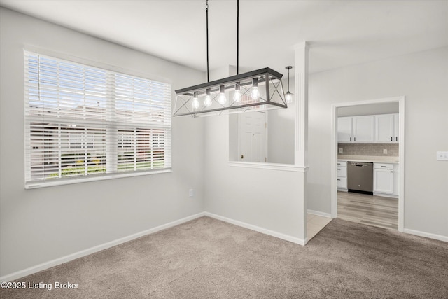 5010 Cotehele Pl, Louisville, KY 40241 - unfurnished dining area featuring light carpet and baseboards