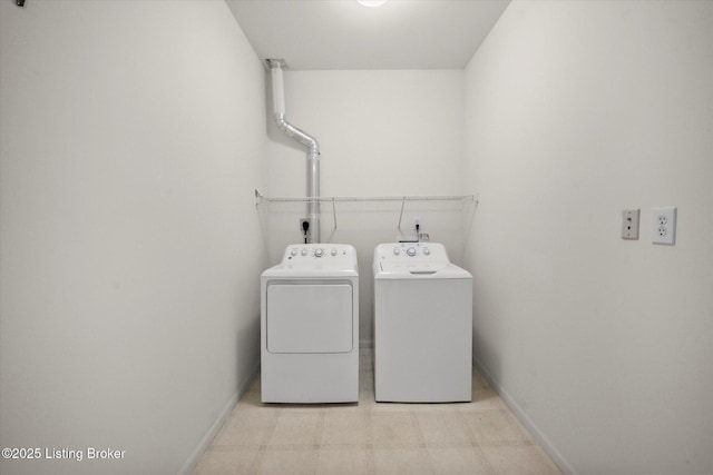 5010 Cotehele Pl, Louisville, KY 40241 - laundry room with washer and dryer, light flooring, and baseboards