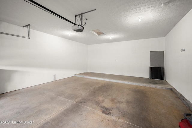 5010 Cotehele Pl, Louisville, KY 40241 - garage featuring a garage door opener