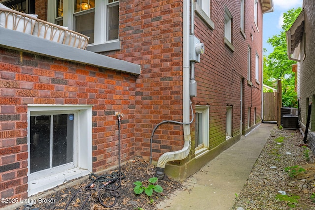 2220 Alta Ave, Louisville, KY 40205 - view of side of home with brick siding and central AC