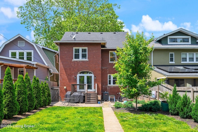 2220 Alta Ave, Louisville, KY 40205 - rear view of house featuring brick siding, central AC, and a gate