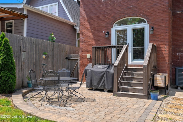 2220 Alta Ave, Louisville, KY 40205 - view of patio with grilling area, entry steps, outdoor dining area, and central AC unit