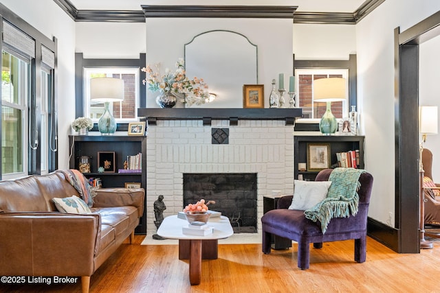 2220 Alta Ave, Louisville, KY 40205 - sitting room featuring crown molding, wood finished floors, and a fireplace