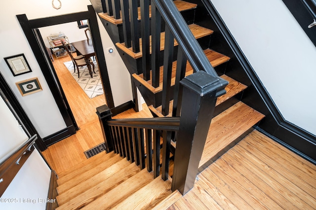 2220 Alta Ave, Louisville, KY 40205 - stairs featuring wood finished floors