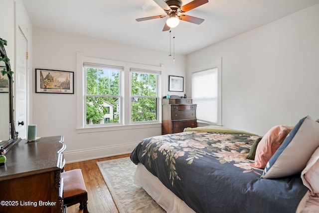 2220 Alta Ave, Louisville, KY 40205 - bedroom with wood finished floors, baseboards, and a ceiling fan