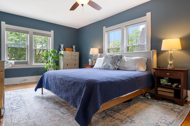 2220 Alta Ave, Louisville, KY 40205 - bedroom featuring wood finished floors, a ceiling fan, and baseboards