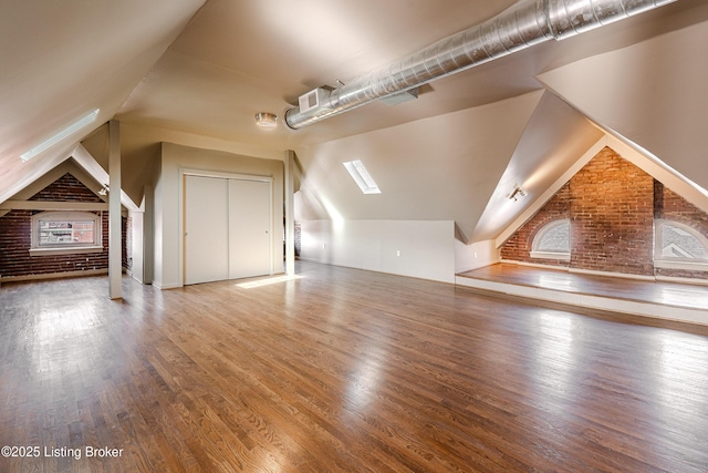 211 Haldeman Ave, Louisville, KY 40206 - additional living space featuring wood finished floors and vaulted ceiling