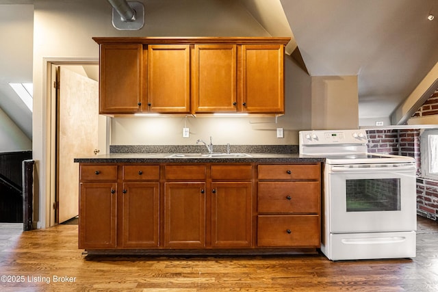 211 Haldeman Ave, Louisville, KY 40206 - kitchen featuring white electric range, a sink, brown cabinets, and wood finished floors