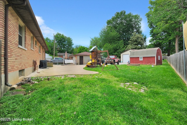 9926 Silverwood Ln, Louisville, KY 40272 - view of yard featuring a patio area and a garage