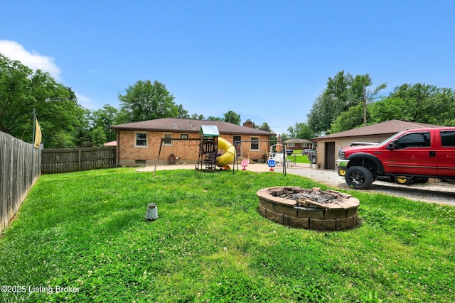 9926 Silverwood Ln, Louisville, KY 40272 - view of yard featuring a fire pit and a playground
