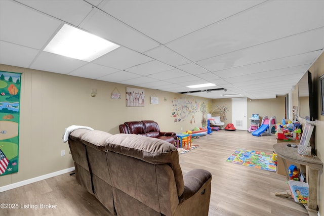 9926 Silverwood Ln, Louisville, KY 40272 - recreation room featuring wood finished floors, a drop ceiling, and baseboards