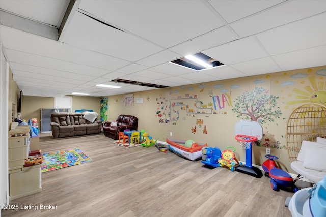 9926 Silverwood Ln, Louisville, KY 40272 - playroom featuring wood finished floors, a paneled ceiling, and wallpapered walls