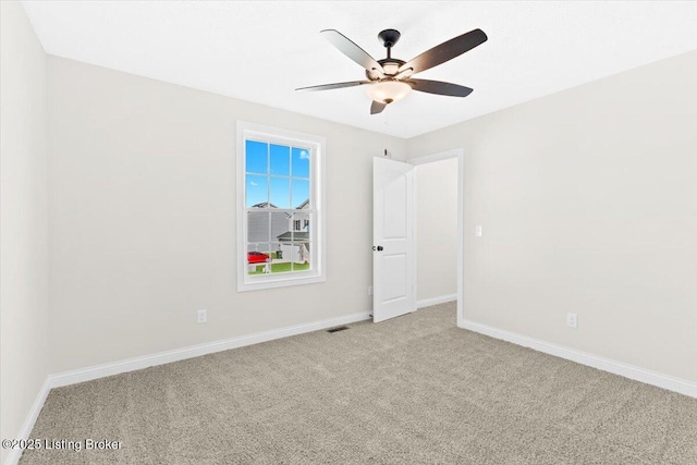 401 Sandy Cir, Elizabethtown, KY 42701 - carpeted empty room featuring a ceiling fan and baseboards