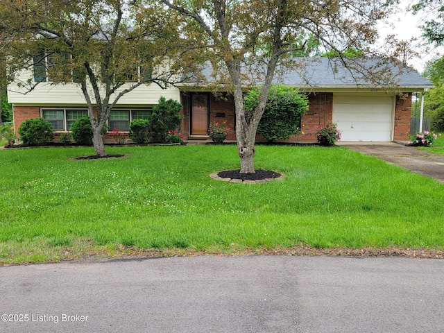 2508 Rhett Ct, Louisville, KY 40242 - view of front of house with brick siding, an attached garage, asphalt driveway, and a front yard