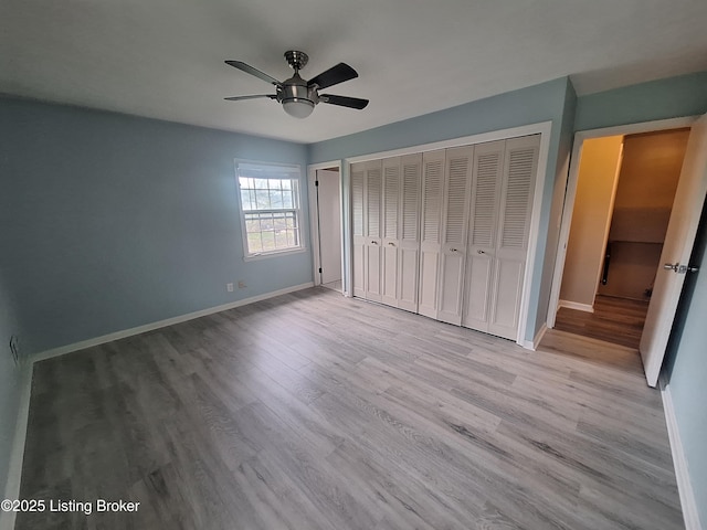 2508 Rhett Ct, Louisville, KY 40242 - unfurnished bedroom featuring baseboards, wood finished floors, ceiling fan, and a closet