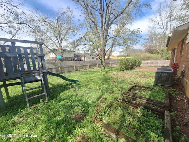 2508 Rhett Ct, Louisville, KY 40242 - view of yard with cooling unit, a deck, and a playground