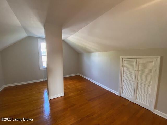 820 Johnson St, Bardstown, KY 40004 - additional living space featuring wood finished floors, lofted ceiling, and baseboards