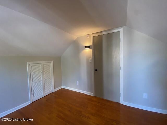 820 Johnson St, Bardstown, KY 40004 - bonus room with vaulted ceiling, wood finished floors, and baseboards