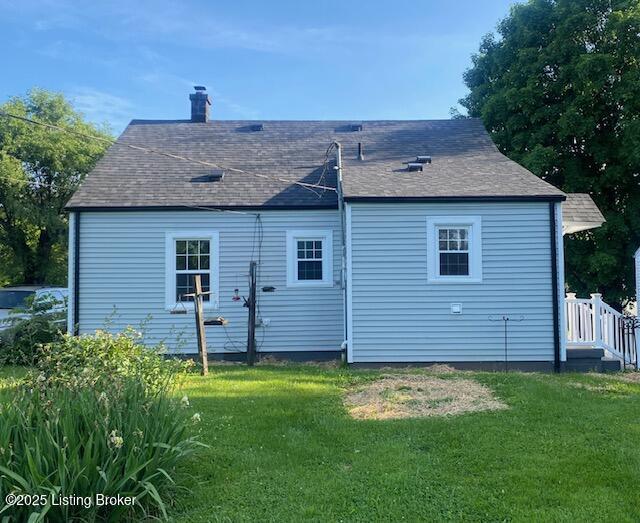 820 Johnson St, Bardstown, KY 40004 - back of property featuring a lawn and a shingled roof