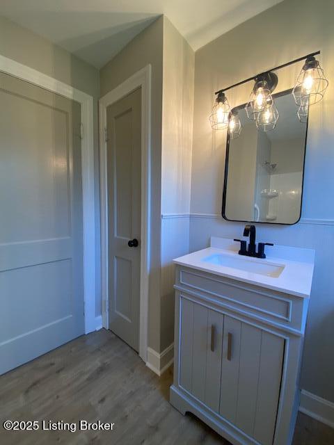 820 Johnson St, Bardstown, KY 40004 - bathroom with vanity and wood finished floors