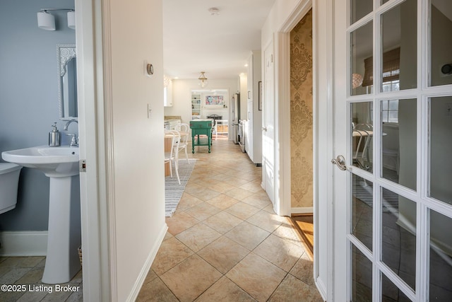 217 Sequoya Rd, Louisville, KY 40207 - hallway with baseboards and french doors
