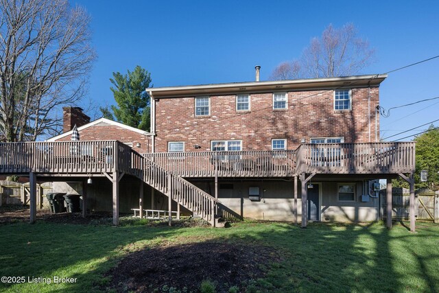217 Sequoya Rd, Louisville, KY 40207 - back of property with a wooden deck, a yard, brick siding, and stairs
