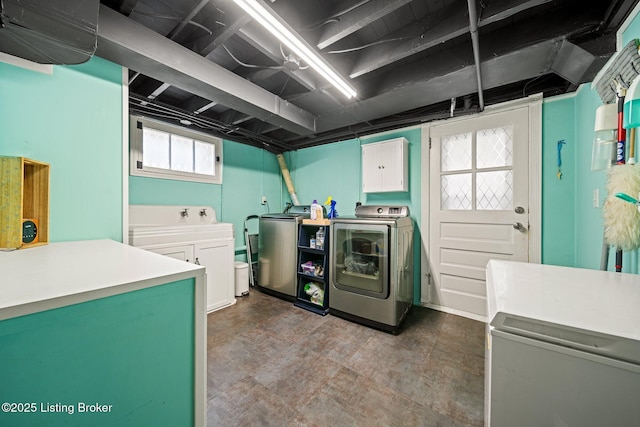 1883 Allgeier Ct, Louisville, KY 40213 - laundry room featuring cabinet space and washing machine and clothes dryer