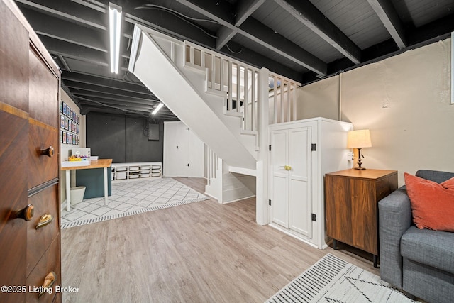 1883 Allgeier Ct, Louisville, KY 40213 - finished basement featuring wood finished floors and stairway