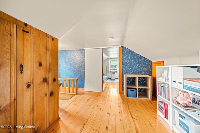 1883 Allgeier Ct, Louisville, KY 40213 - rec room featuring wallpapered walls, light wood-style flooring, and lofted ceiling