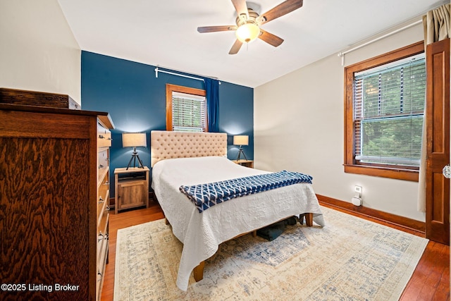 1883 Allgeier Ct, Louisville, KY 40213 - bedroom with wood finished floors, baseboards, and a ceiling fan