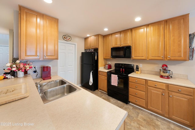 321 Lagrange Villa Dr, La Grange, KY 40031 - kitchen with black appliances, a sink, light countertops, and recessed lighting