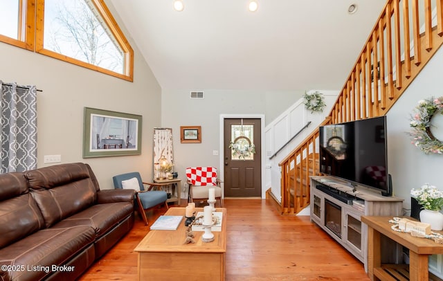 151 Pleasant Railway, Taylorsville, KY 40071 - living room featuring stairs, plenty of natural light, high vaulted ceiling, light wood-style floors, and recessed lighting
