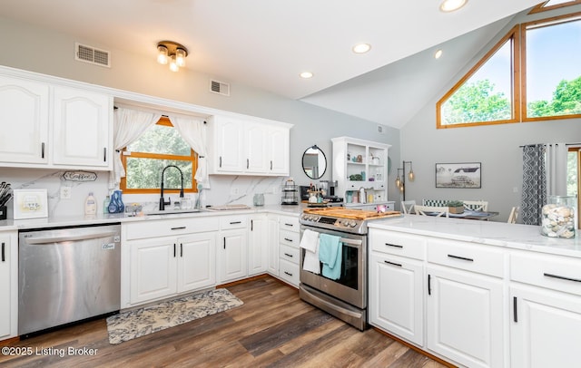 151 Pleasant Railway, Taylorsville, KY 40071 - kitchen with stainless steel appliances, a sink, decorative backsplash, light countertops, and white cabinets