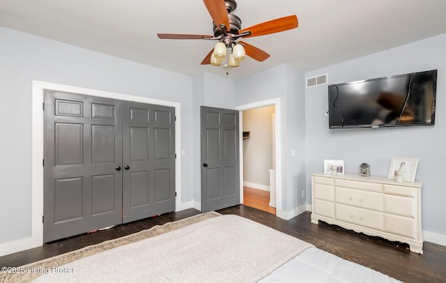 151 Pleasant Railway, Taylorsville, KY 40071 - bedroom featuring dark wood-style floors, baseboards, a closet, and ceiling fan