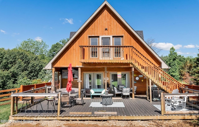 151 Pleasant Railway, Taylorsville, KY 40071 - rear view of property featuring stairs, a deck, and outdoor dining space