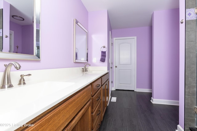 4701 Lost Valley Dr, Crestwood, KY 40014 - full bath with wood finished floors, double vanity, and baseboards