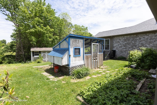 4701 Lost Valley Dr, Crestwood, KY 40014 - view of home's exterior featuring a lawn, brick siding, and a shingled roof